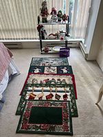 Overview of rugs laid on floor and shelf with decorations