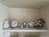 All eight bird items displayed on shelf