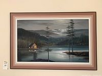 Front view of framed landscape painting