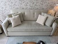 Front view of Stylus 3-seat sofa with pillows