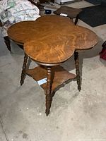 full view of antique clover-leaf table