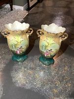 Front view of both matching porcelain vases