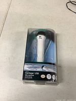 Front view of sealed Logitech Vantage USB Microphone package