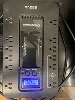 Top view of UPS showing brand, model and outlet layout