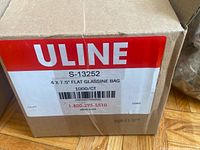 Box exterior showing Uline label with model and size