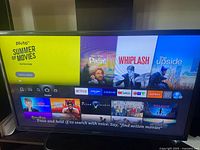 Front view of Sony TV powered on displaying interface