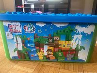 Front of Mega Bloks First Builders tub showing brand and graphics