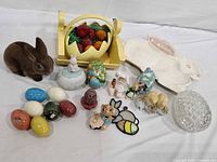 Group shot showing most items including platter, basket with eggs, figurines and stone eggs
