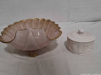 Overall view of both pink milk glass pieces