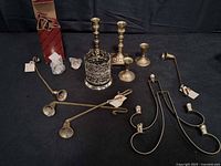 overview of all brass items on black surface