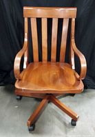 Front view of wooden swivel office chair
