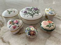 All six trinket boxes top view showing patterns and shapes