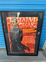 Front view of framed Polish "Ostatni Cesarz" movie poster