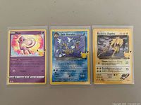 Front view of all three Pokémon Celebrations cards in sleeves