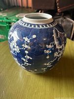 Side view of vase showing blossom pattern