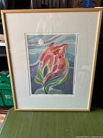 Framed abstract floral watercolor under glass