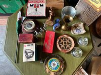 Overall lot showing assorted games, decor pieces, tools and small collectibles