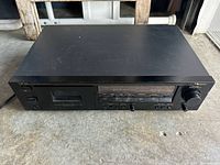 Front view of Nakamichi CR-3A cassette deck showing full faceplate and wear