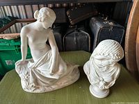 Both porcelain pieces side by side on table