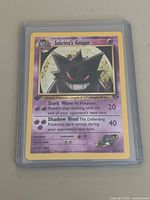 Front of Sabrina’s Gengar 1st Edition card in sleeve