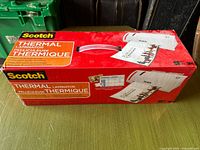 Front of sealed Scotch Thermal Laminator box