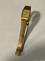 Full watch showing bracelet, clasp and safety chain
