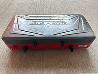 Stove closed showing exterior, brand name Summit on front