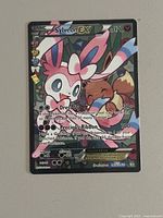 Front of Sylveon EX full-art card showing artwork, HP, attacks