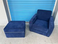 Armchair and ottoman together showing scale and matching fabric