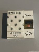 Front of sealed Caron Bellodgia eau de cologne gift box showing branding and 57 ml volume