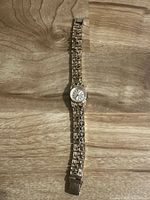 Full view of Seiko wristwatch showing case, dial, and entire bracelet