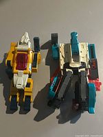 Both Transformers figures side-by-side top view