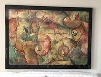 Front view of framed abstract print showing full artwork and frame