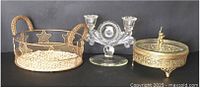 Overall view of candy dish, candlestick and basket