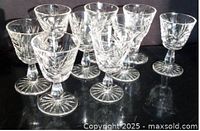 Group view of all nine pinwheel crystal stem shot glasses