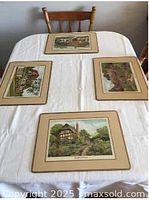 Tablecloth spread on table with four placemats in place