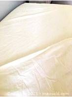 Twin size fitted sheet displayed on mattress, off-white colour