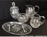 Full set showing tray, milk pitcher, creamer, lidded sugar bowl, open sugar bowl