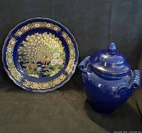 Front view of cobalt plate and lidded jar together