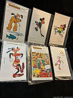 Six sealed decal packs laid out