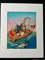 Front view of cel matted, showing full image of Donald Duck and nephews in boat