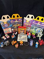 Entire lot overview showing boxes, toys, decals