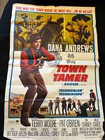 Full view of folded poster showing artwork, title, and credits