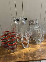 Group shot of all glasses, bottles, milk bottles and mason jar on tabletop