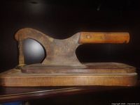 Side view showing full chopper and base