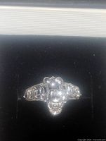 Top view of polished sterling silver dragon ring