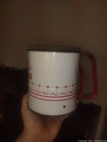 Side view showing Androck branding and tulip motif