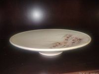 Side view showing shallow profile and foot of bowl