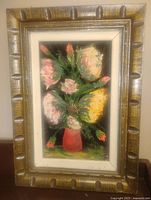 Full view of framed oil painting, carved wood frame, floral subject