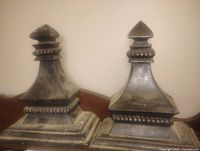 Two matching decorative wall shelves front view